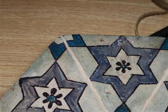 An Islamic hexagonal tile, 43cm sq.